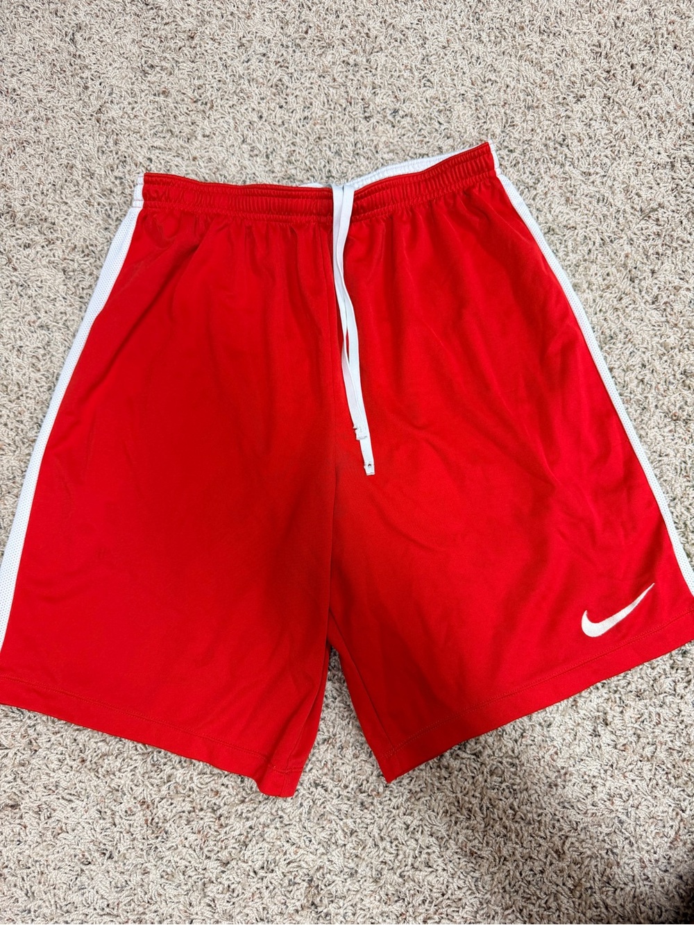 Nike Red Shorts with White Swoosh and Side Trim